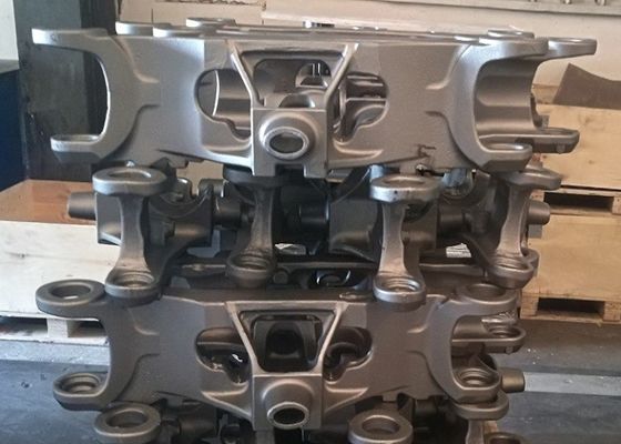 Детали рулевого моста из чугуна OEM, отлитые в песчаные формы, одобрены ISO 9000 для строительной техники