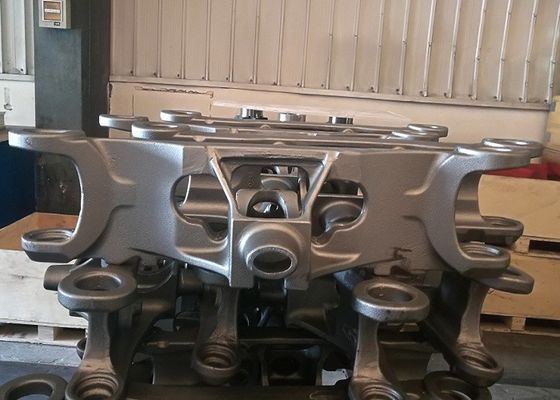 Детали рулевого моста из чугуна OEM, отлитые в песчаные формы, одобрены ISO 9000 для строительной техники